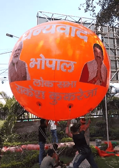 Saffron balloon fluttering on the sand